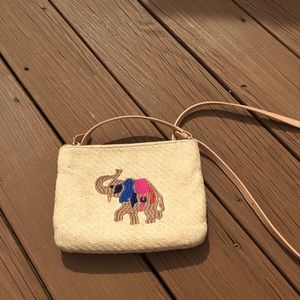 Straw embroidered elephant purse